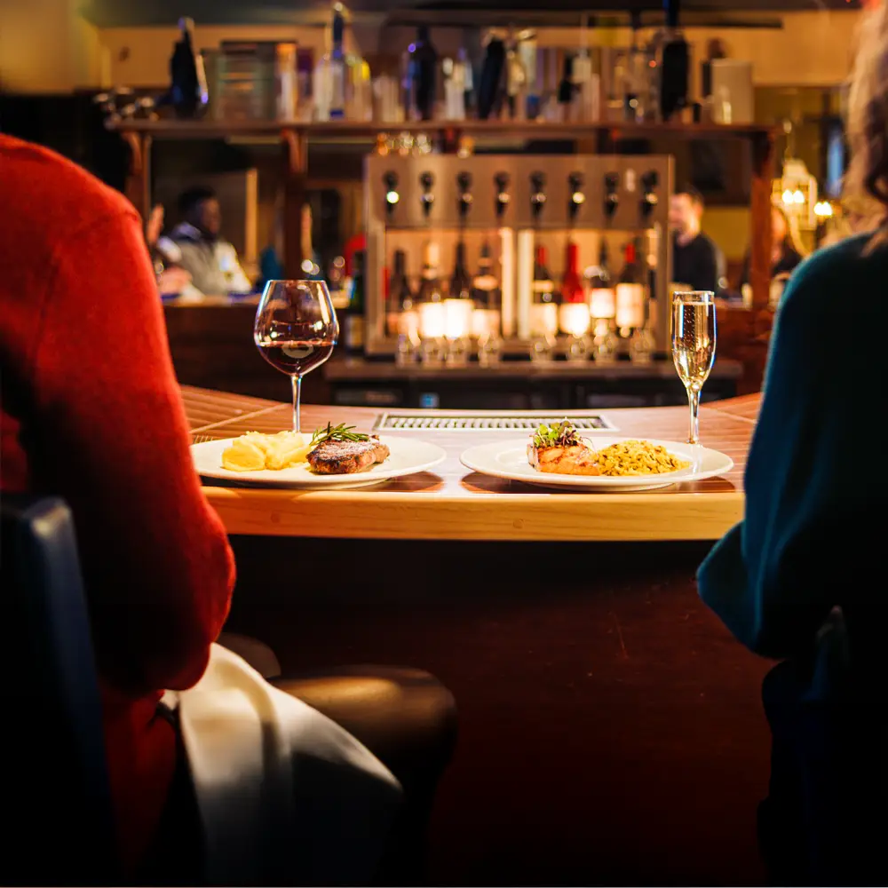 Couple seated at Lower Deck Bar